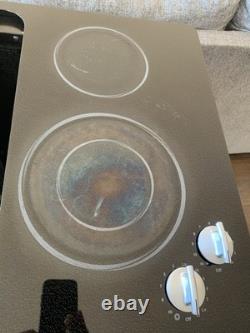 Jenn Air 30 Black Glass Electric Cooktop 4-Burner With Downdraft -JED8430BDB18